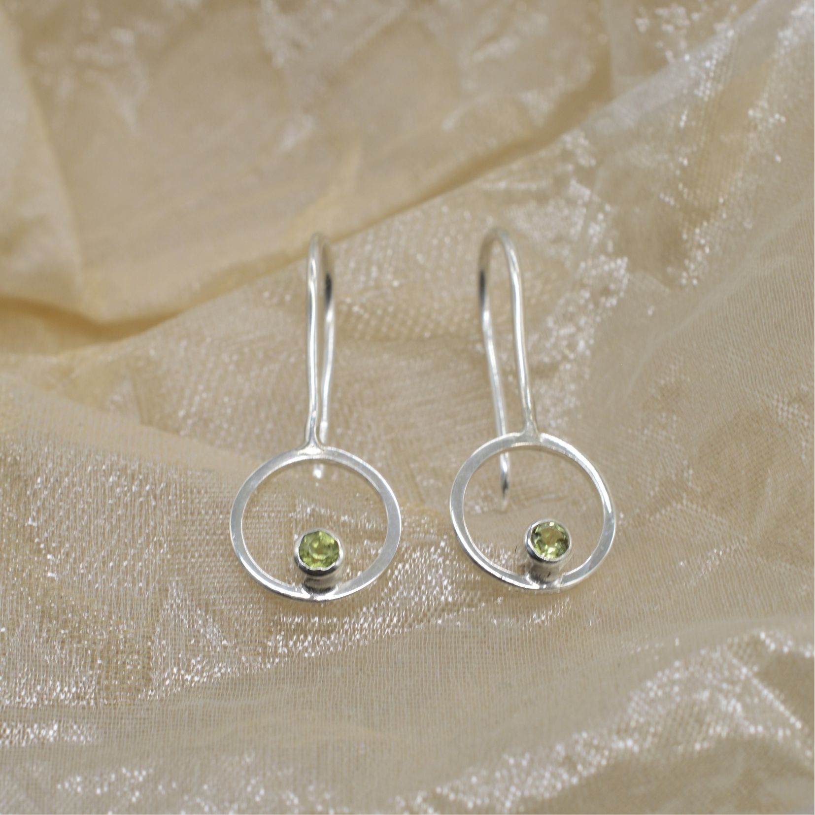 Oorbellen rondo peridoot groen